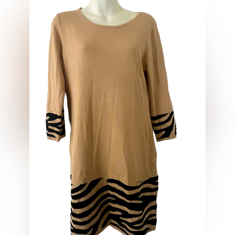 A beige vintage dress with black stripes and matching garment
